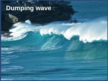 Powerful plunging wave breaking with white spray